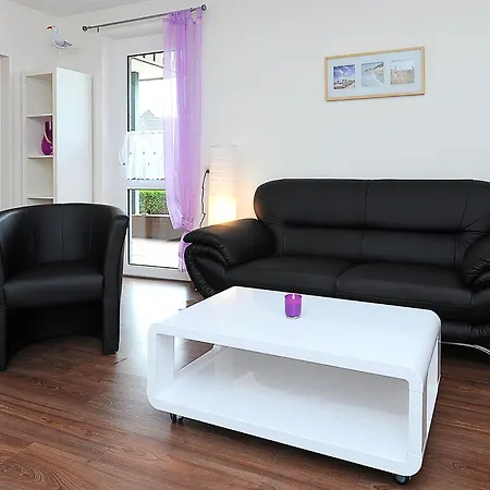 Апартаменты Haus Hafenromantik Нойхарлингерзиль